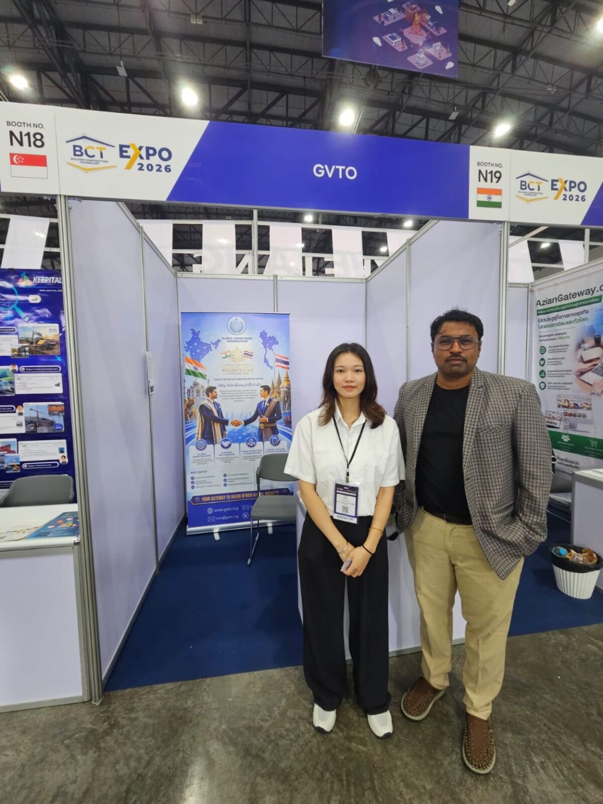 Welcome to the GVTO Stand — Beneath the GVTO name board, team members greet exhibitors and visitors, opening conversations on international business collaboration.