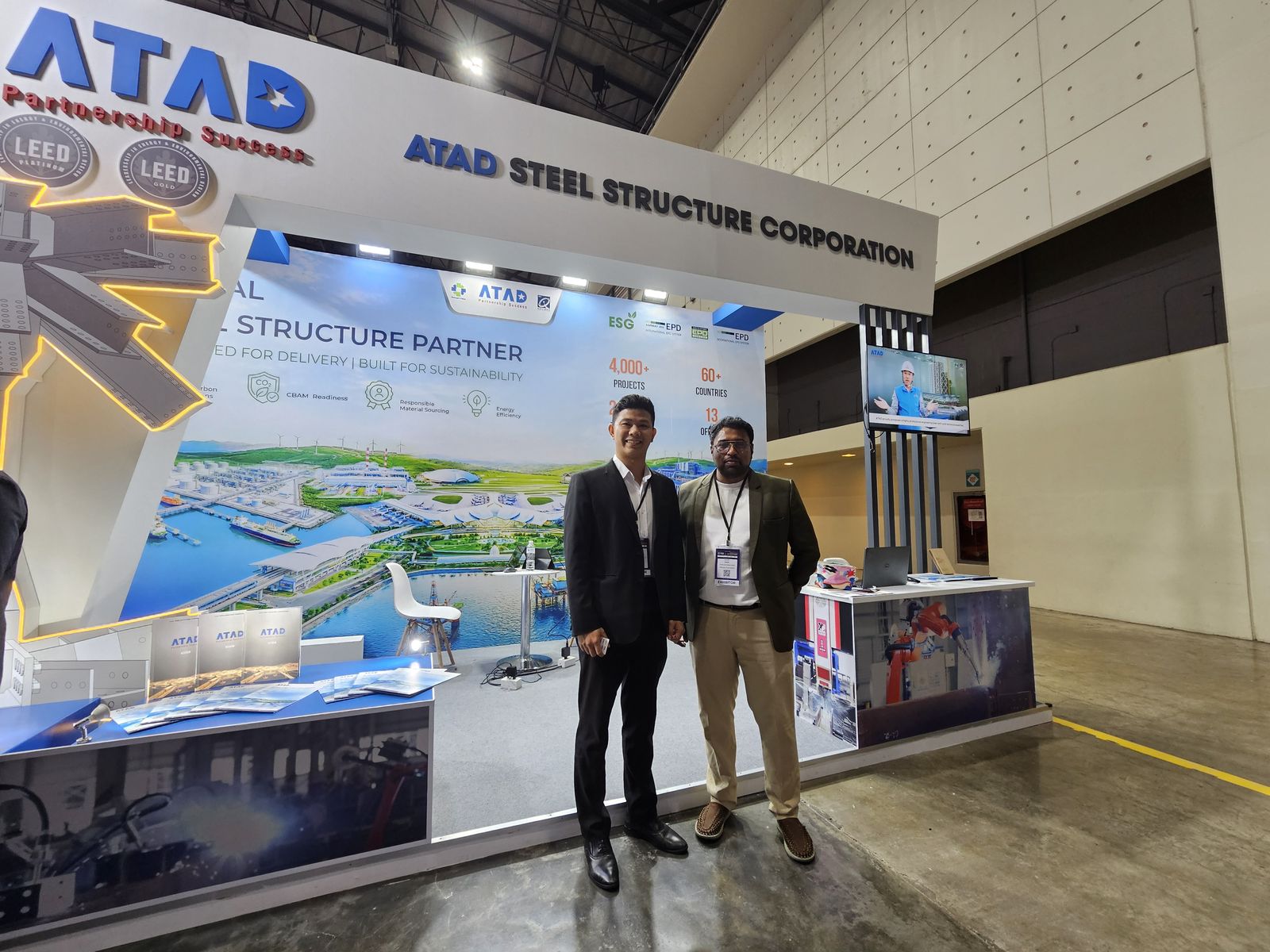 GVTO representative with an exhibitor at the ATAD Steel Structure Corporation booth, BCT Expo 2026