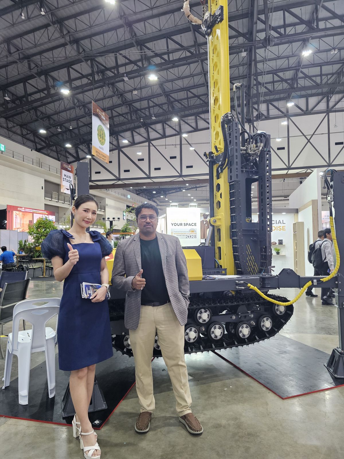 GVTO representative beside a tracked drilling rig on display at BCT Expo 2026