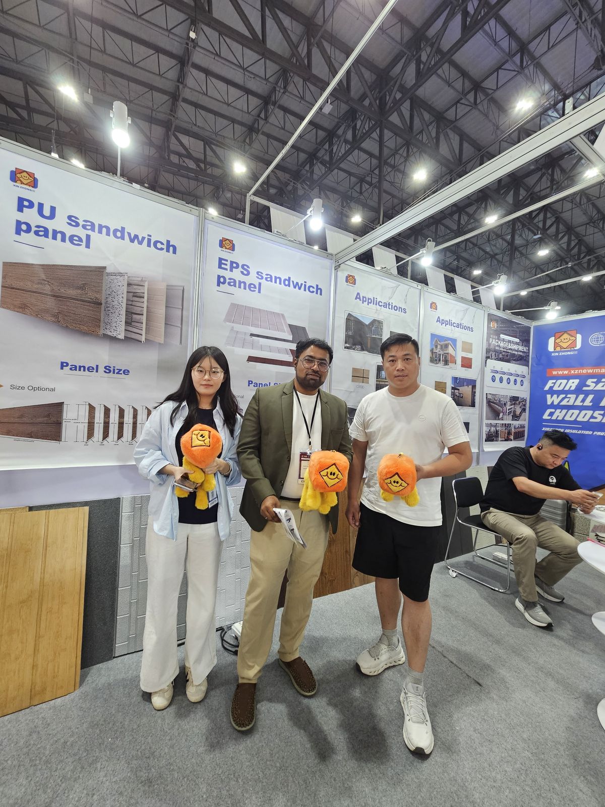 GVTO representative with exhibitors at a sandwich-panel manufacturer booth, BCT Expo 2026